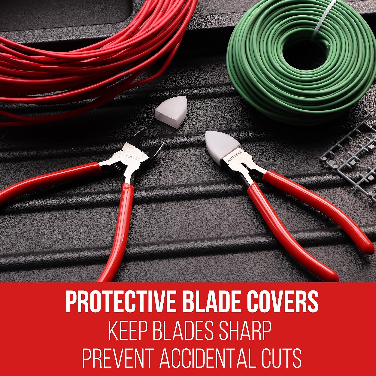 WORKPRO diagonal cutters with blade covers on red and green cable wires, red handles