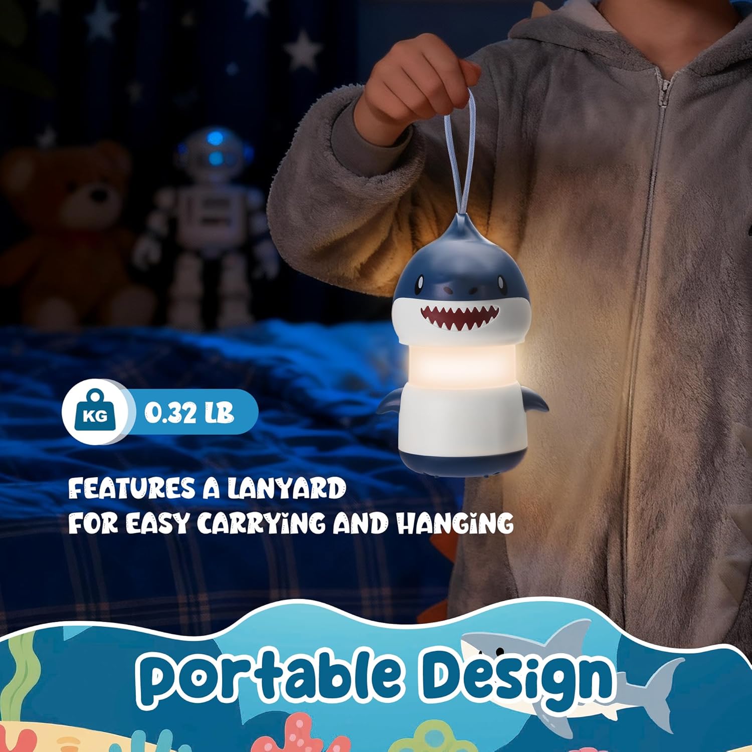 Blue shark-shaped battery lantern with loop lanyard, held by a child, glowing
