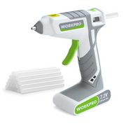 White cordless hot melt glue gun with green grip and stacked white glue sticks