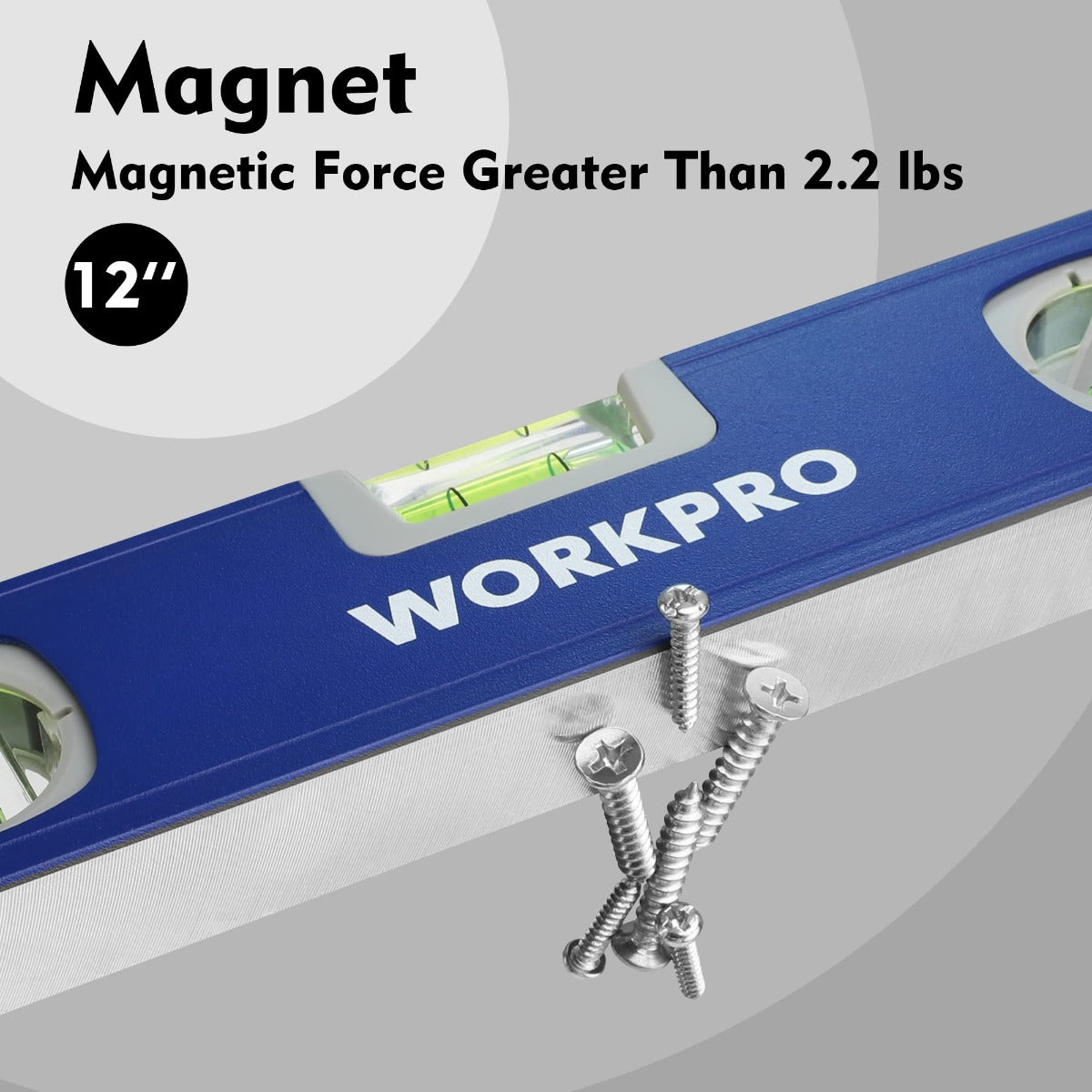 Blue spirit level bar with green vials and attached metal screws for magnetic mounting