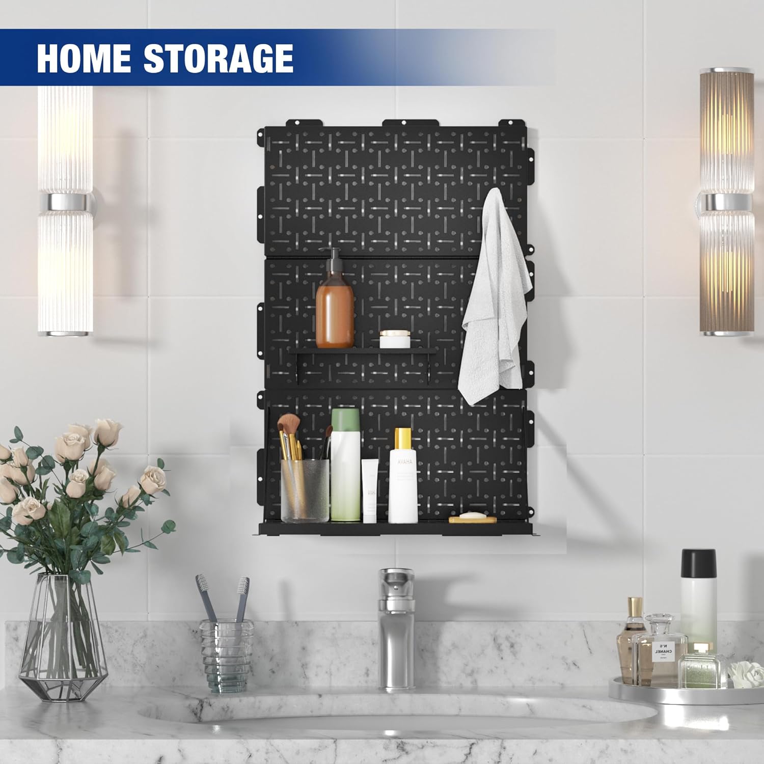 Black metal pegboard organizer mounted on wall with hooks holding bottles and towel