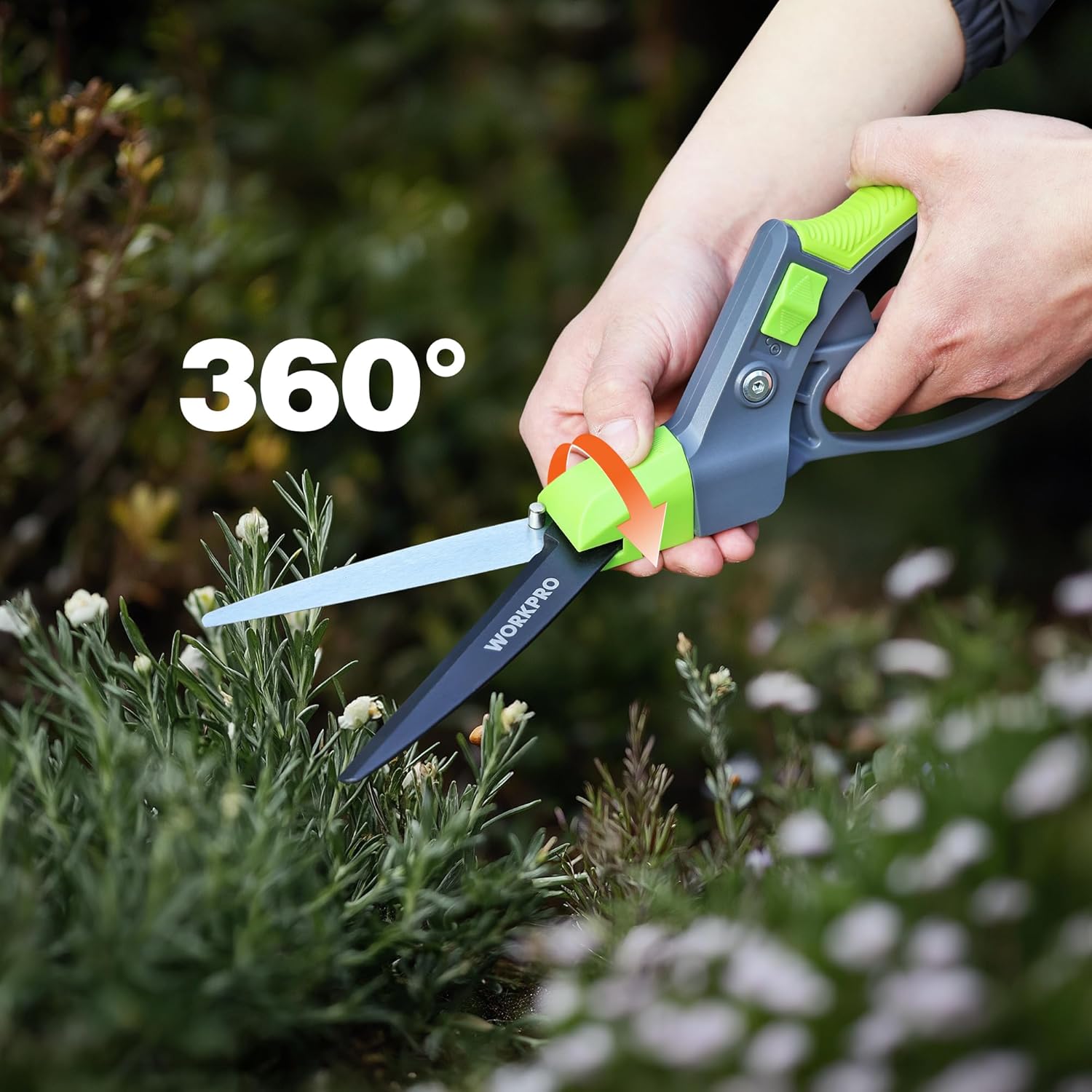 WORKPRO grass shears in use with 360° rotating blade held above plants