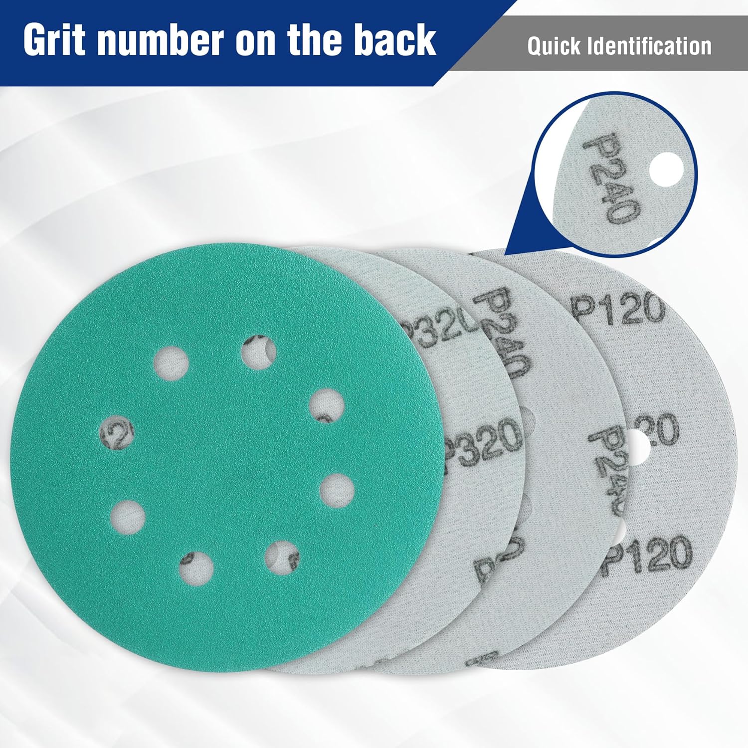Green sanding disc with visible grit number on the back, stacked set