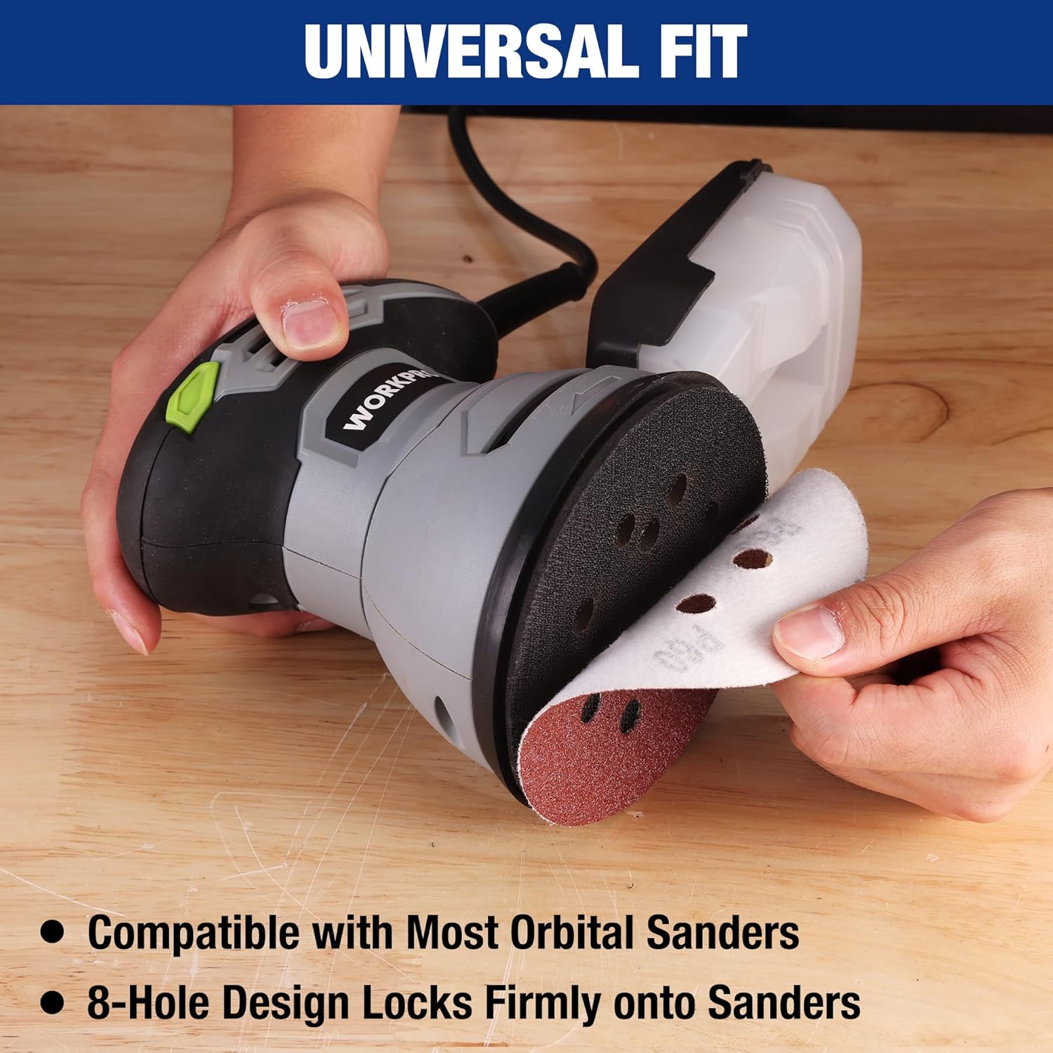 Orbital sander with dark red-brown sanding discs, round 8-hole pattern