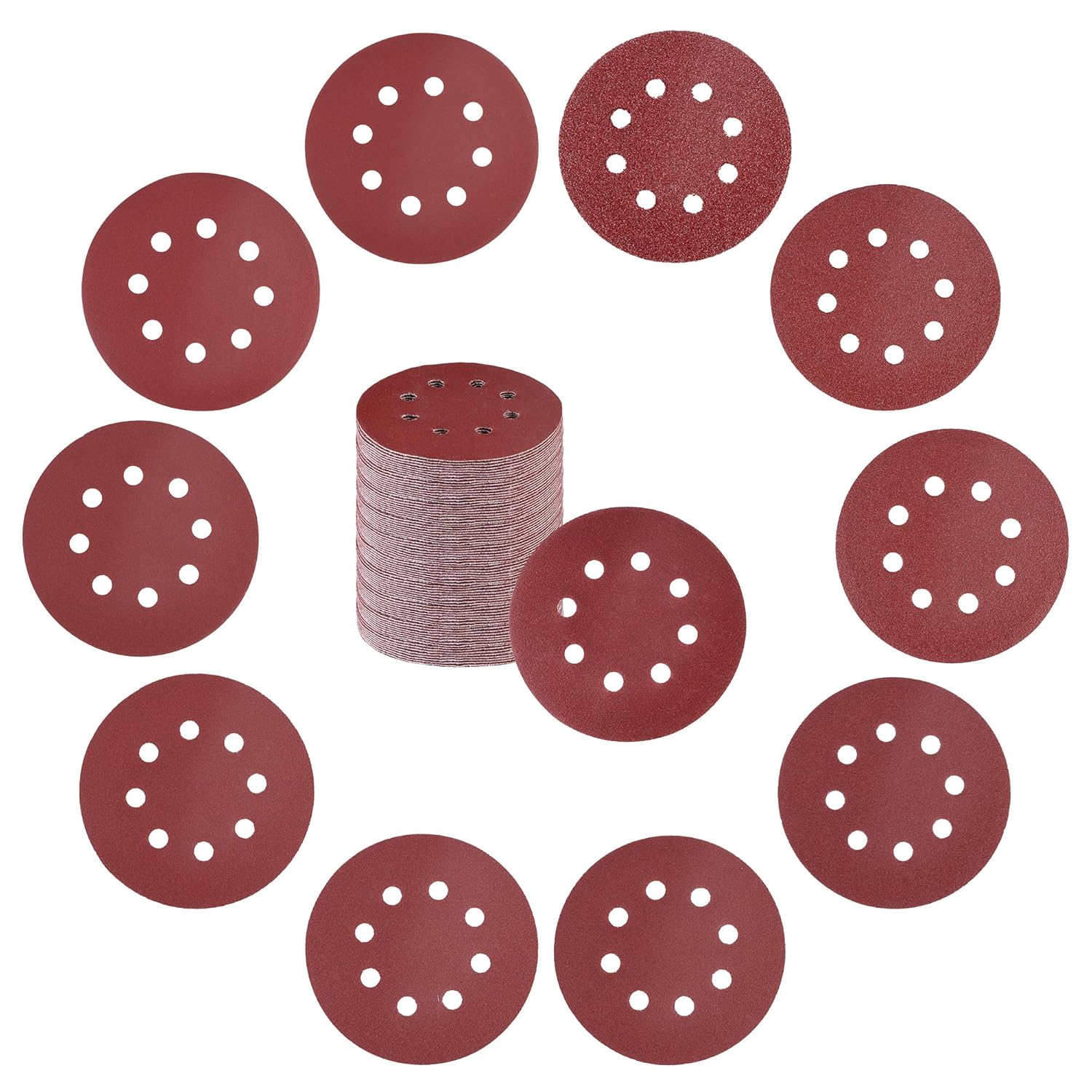 Assorted 5-inch round sanding discs, dark red-brown, stacked and laid out with 8 holes