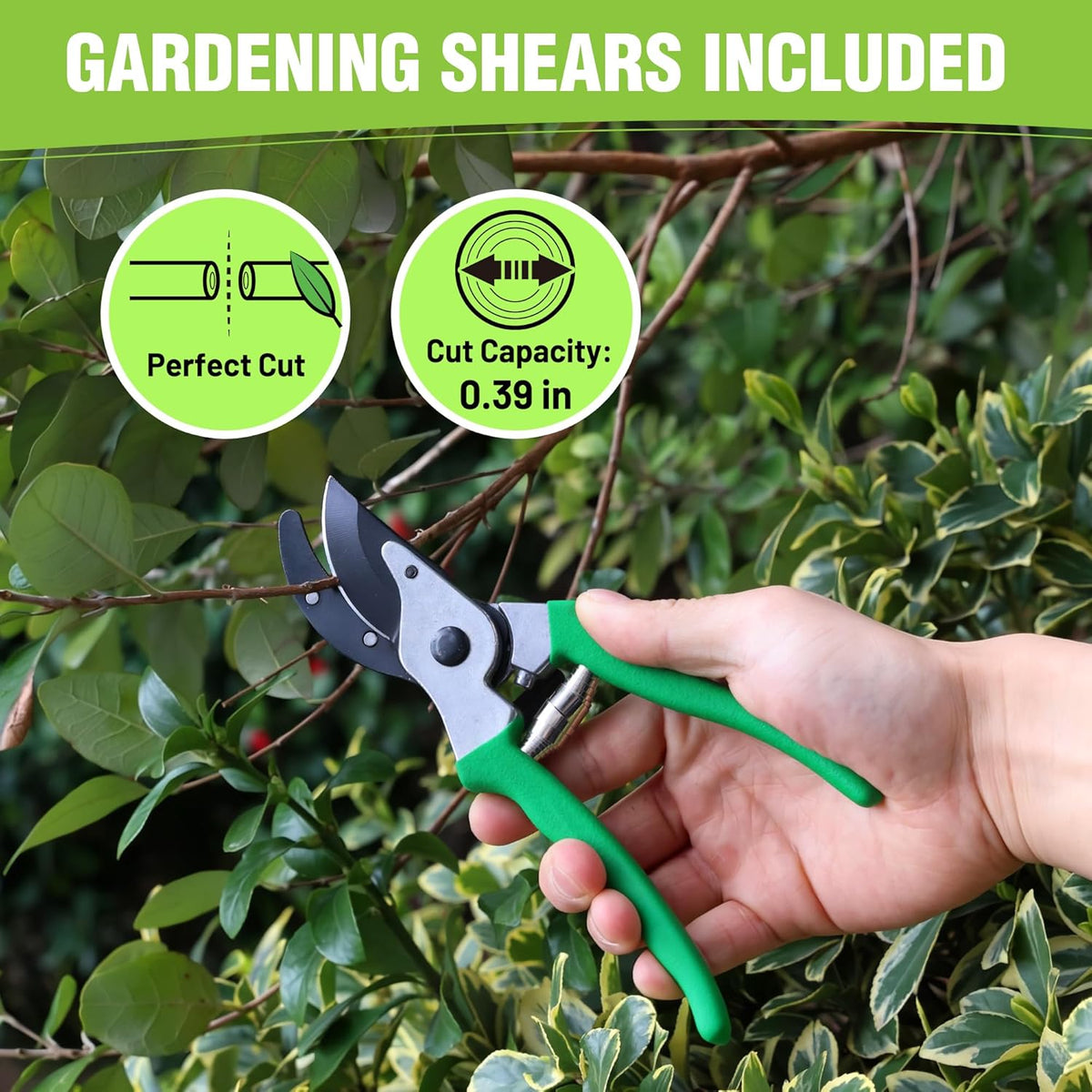 Garden shredder setup with green-handled pruning shears in front of leaf branches.