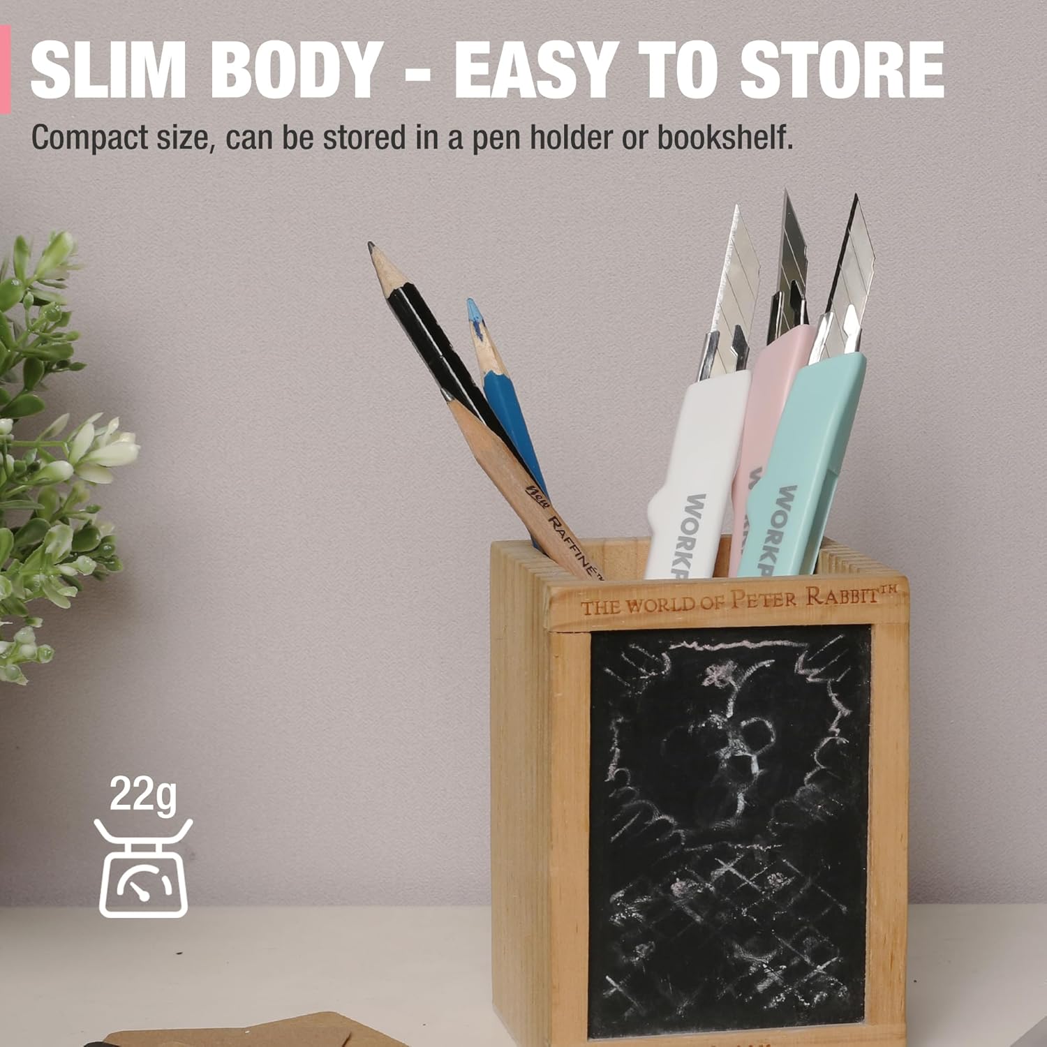 Compact 3-pack utility knives with slim pastel handles stored in a wooden desk holder