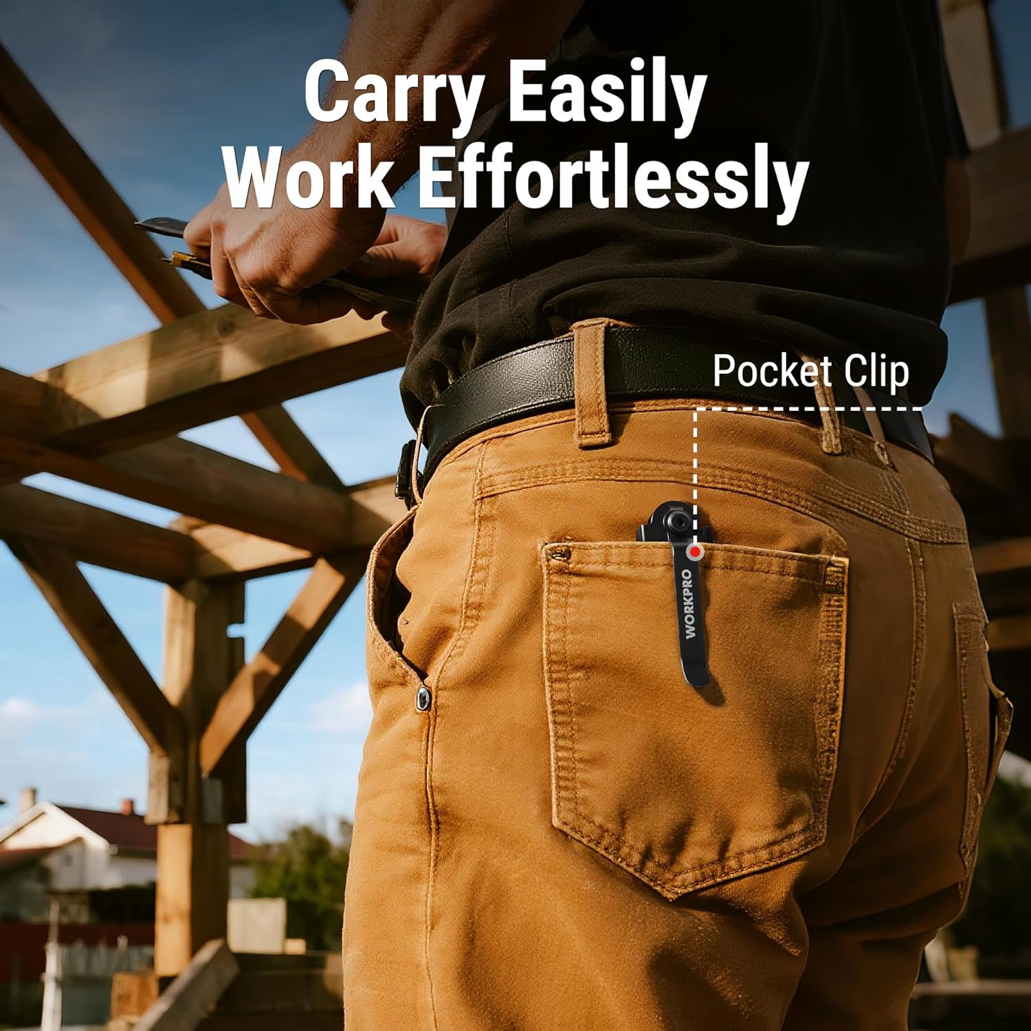 Green folding utility knife with pocket clip attached on work pants