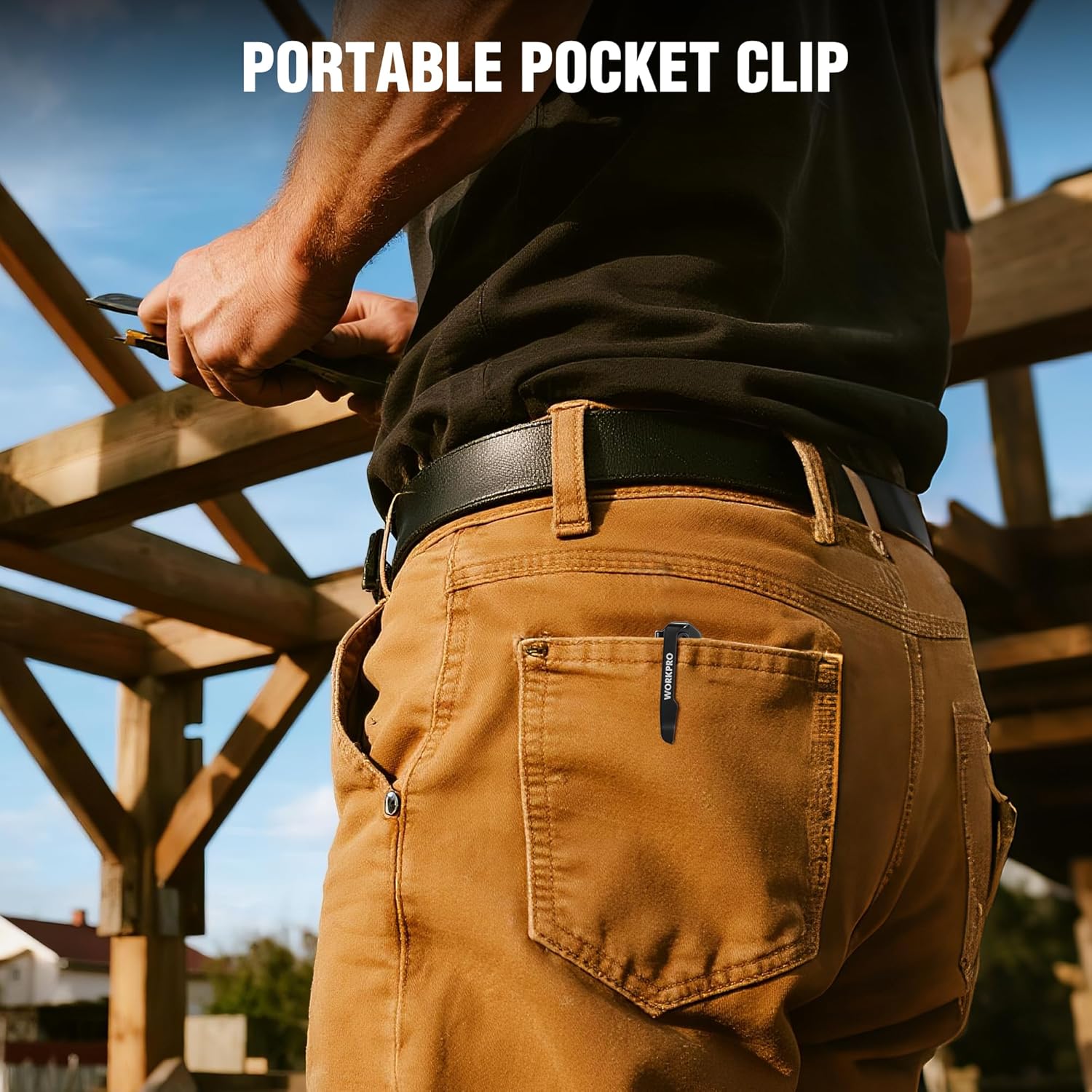 Pocket-clip folding utility knife attached to work pants waistband