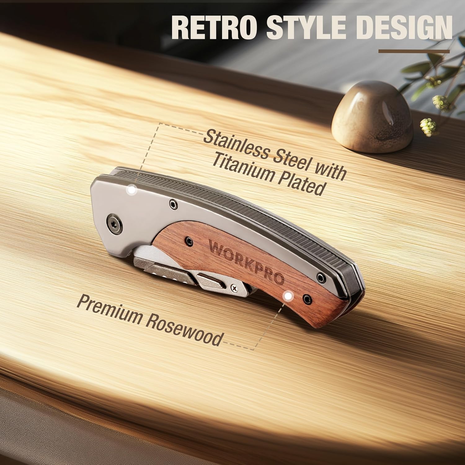 Folding pocket knife with rosewood handle resting on a wooden board