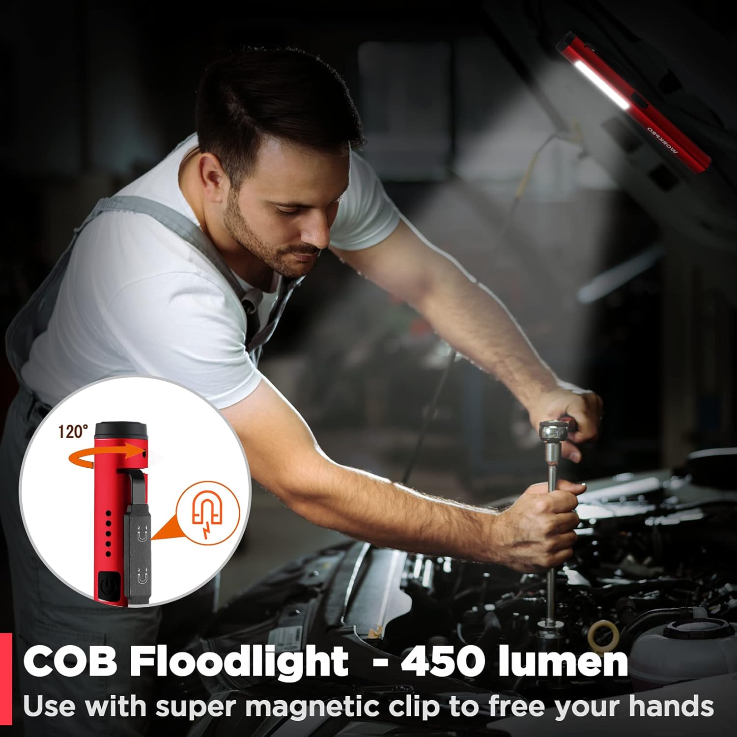 Red WORKPRO penlight shining bright beam toward a vehicle engine bay