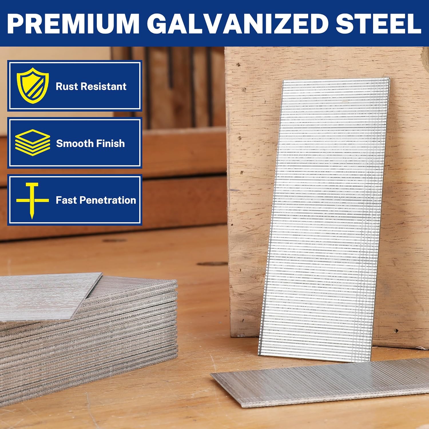 Silver galvanized brad nails on wood boards with smooth, chisel-point surfaces