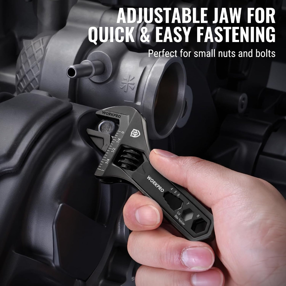 WORKPRO 4 inch adjustable wrench multitool in metal with wide jaw opening, shown in hand tightening a bolt