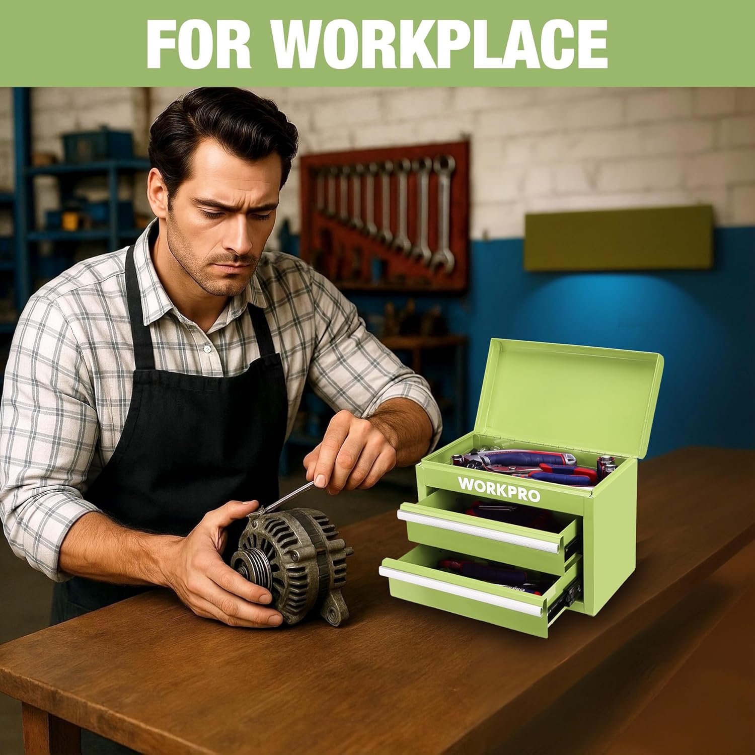 Macaron green WORKPRO mini toolbox open on a workbench, showing two drawer compartments