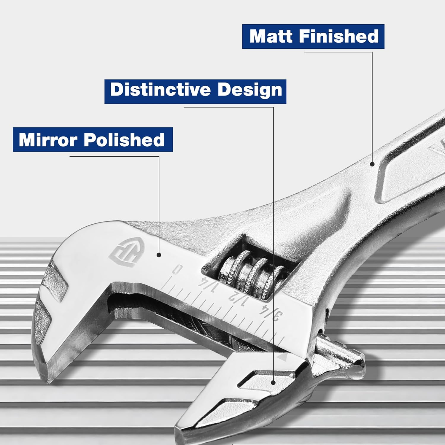 Chrome adjustable wrench close-up with etched scale and knurled adjustment nut