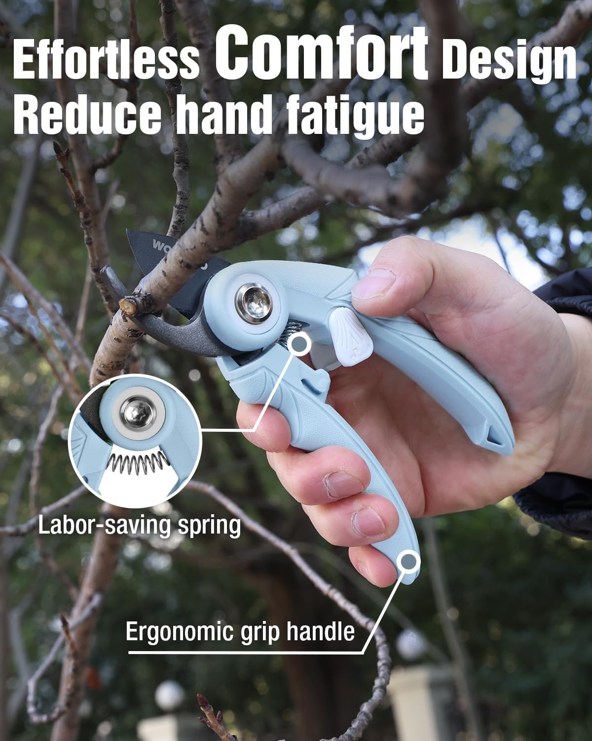 Blue ergonomic hand pruning shears with spring and comfort grip, held on a branch