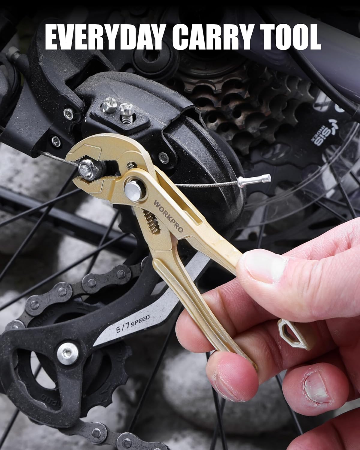 WORKPRO mini water pump plier in hand on a bicycle chain, champagne finish