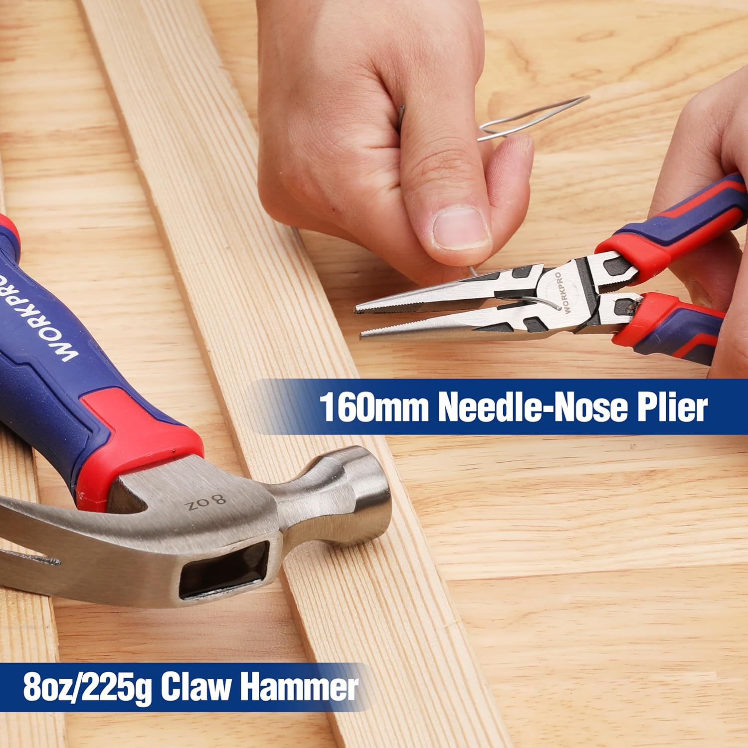 WORKPRO needle-nose pliers and claw hammer with blue-and-red handles on wood