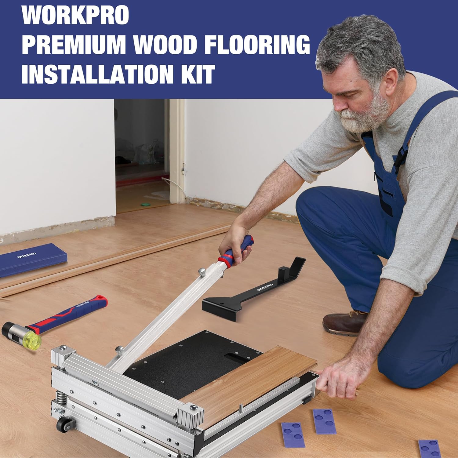 Laminate flooring installation kit with pull bar, spacers, tapping block, and mallet