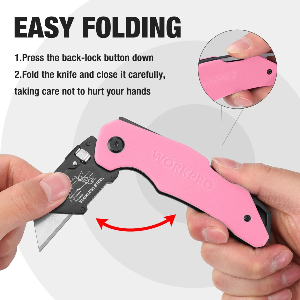 Pink G10 folding utility knife held open, showing black blade and lock button