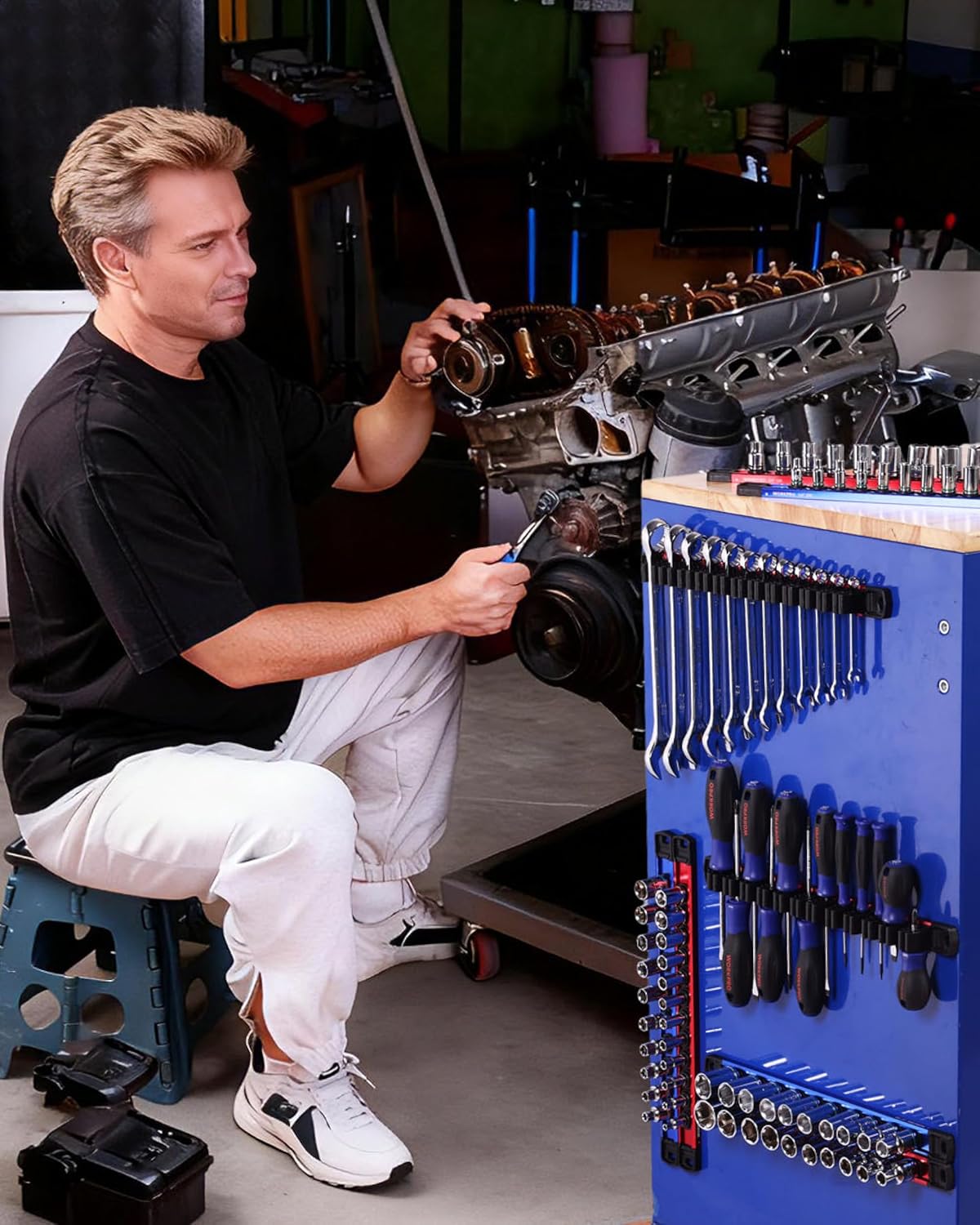 Magnetic socket organizer on workbench with blue and red rails holding sockets