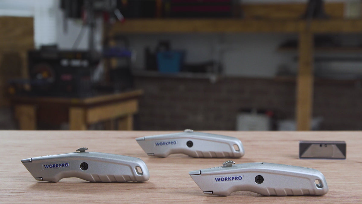 Load video: WORKPRO Retractable Utility Knife and Self-retracting Safety Box with 2 Extra Blades Included