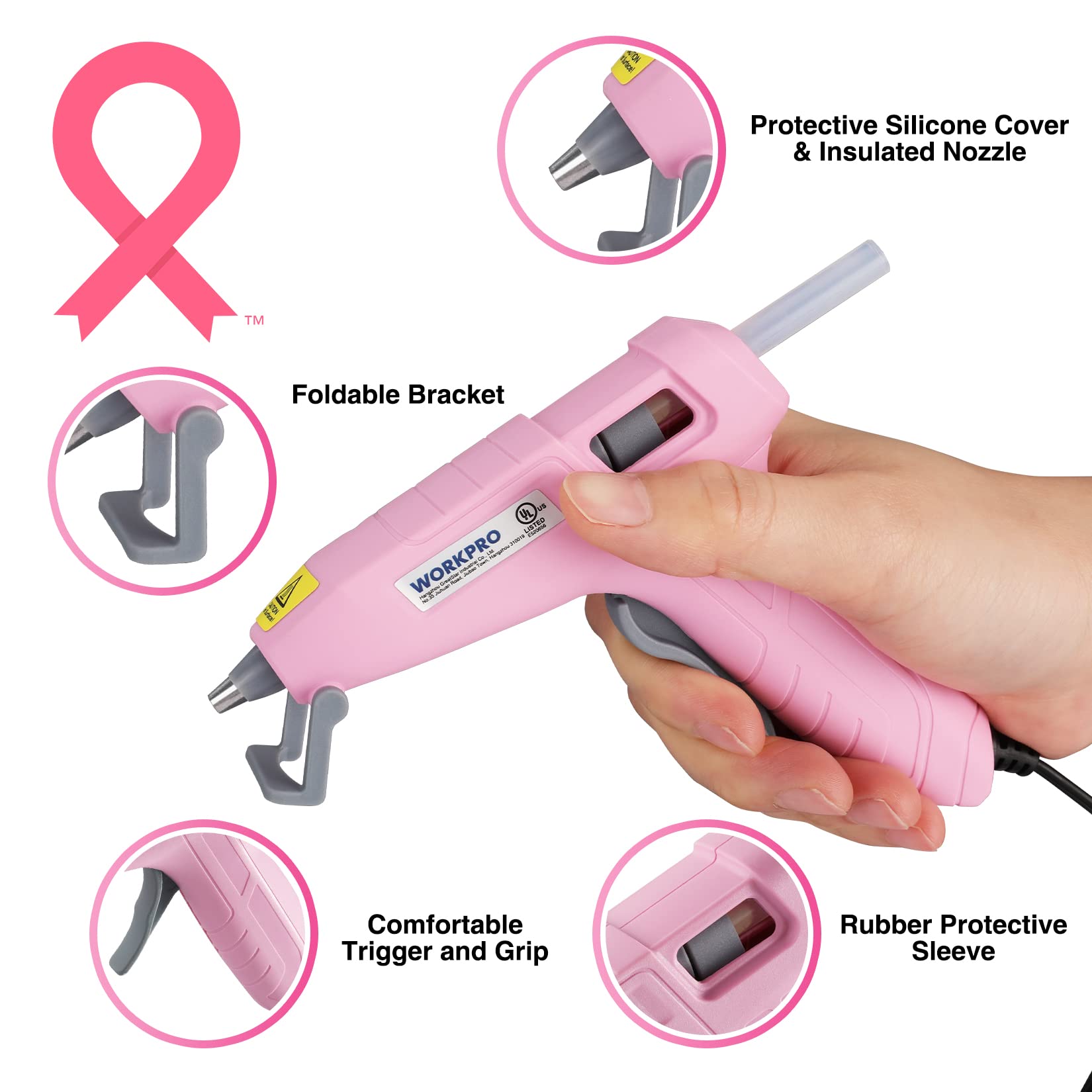 Pink mini hot glue gun in hand with protective silicone cover and insulated nozzle
