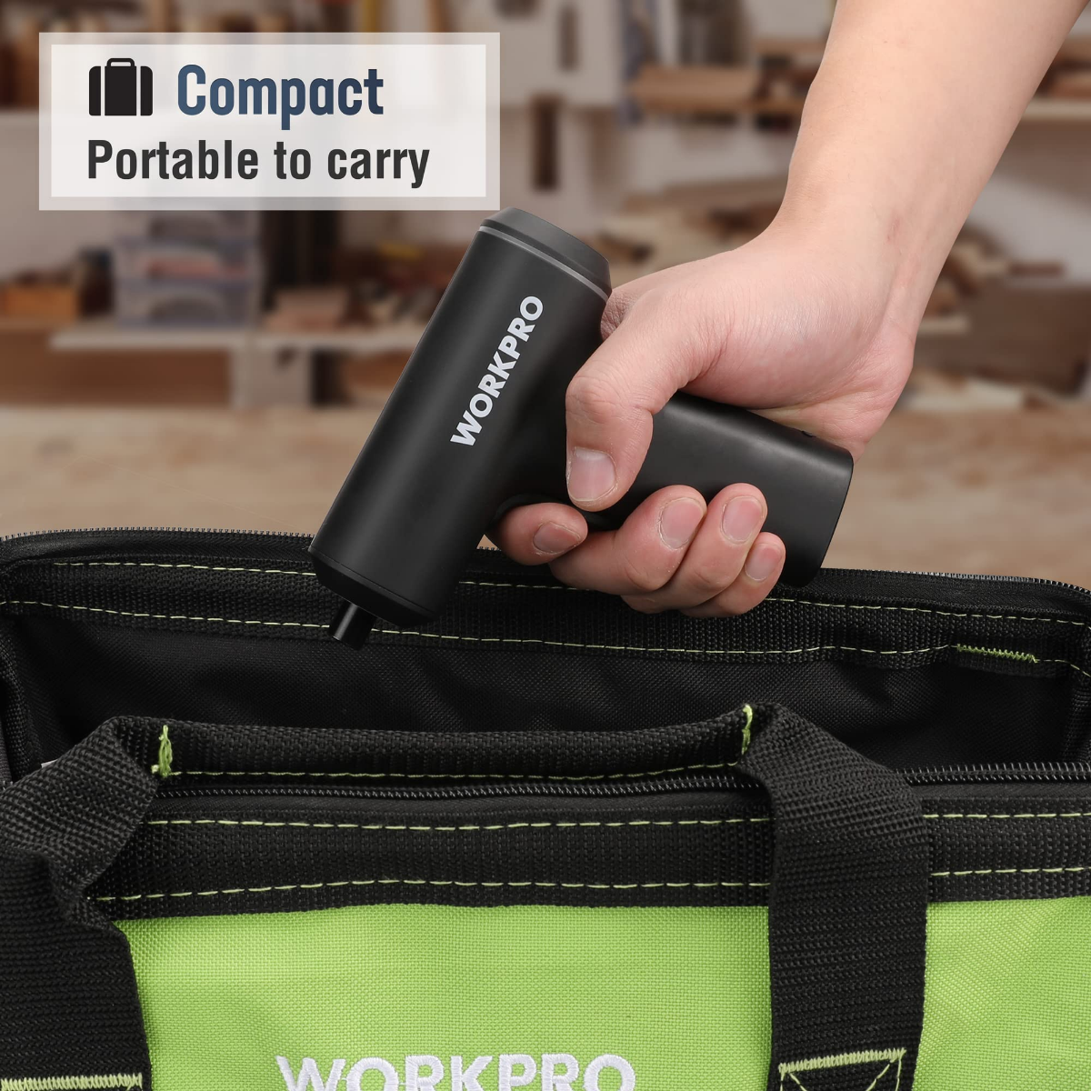 Cordless electric screwdriver, black compact tool held above a storage bag