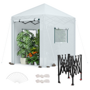 Portable walk-in greenhouse with white mesh walls, zip door panels, and black frame