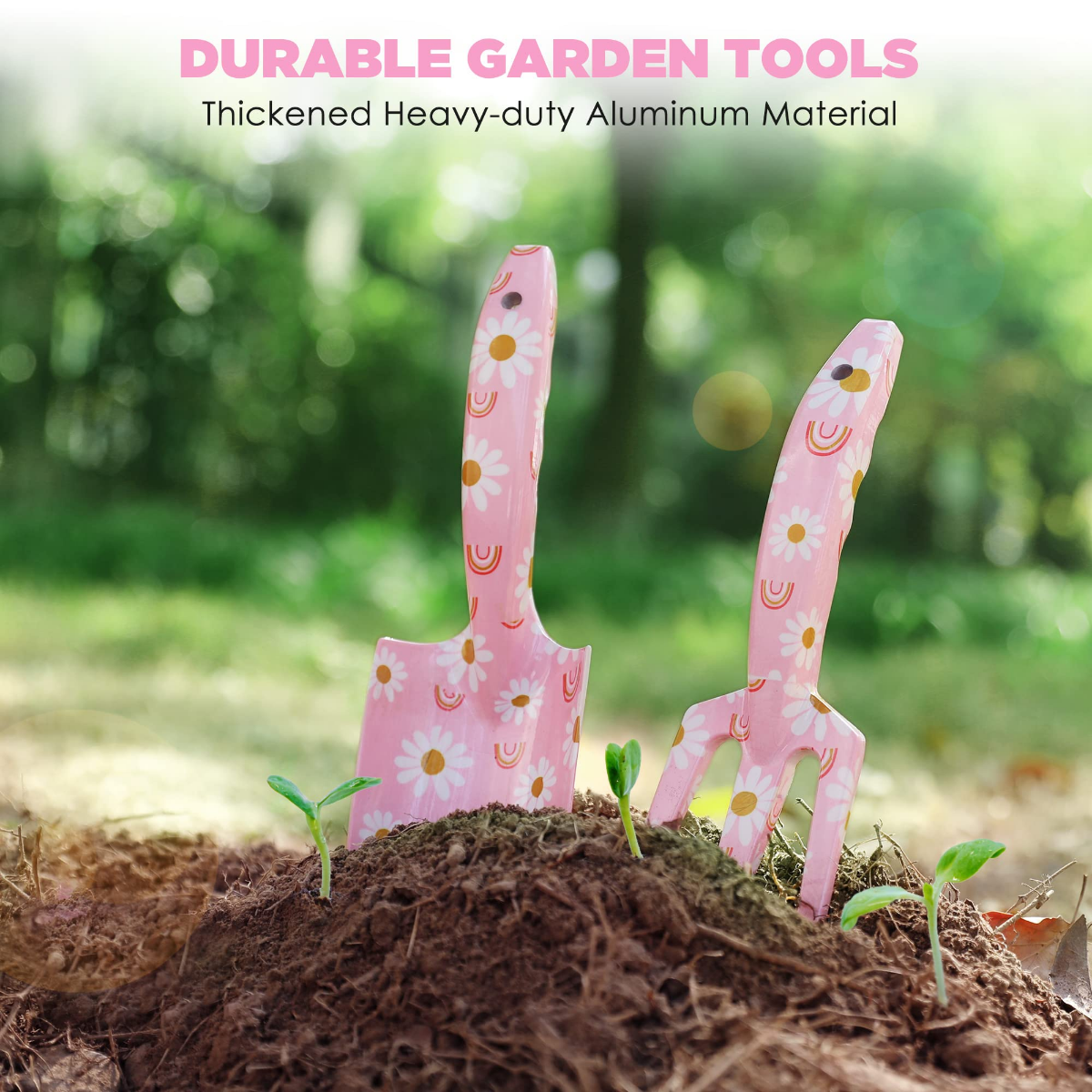 Pink floral aluminum garden tool set with two weeding tools inserted in soil