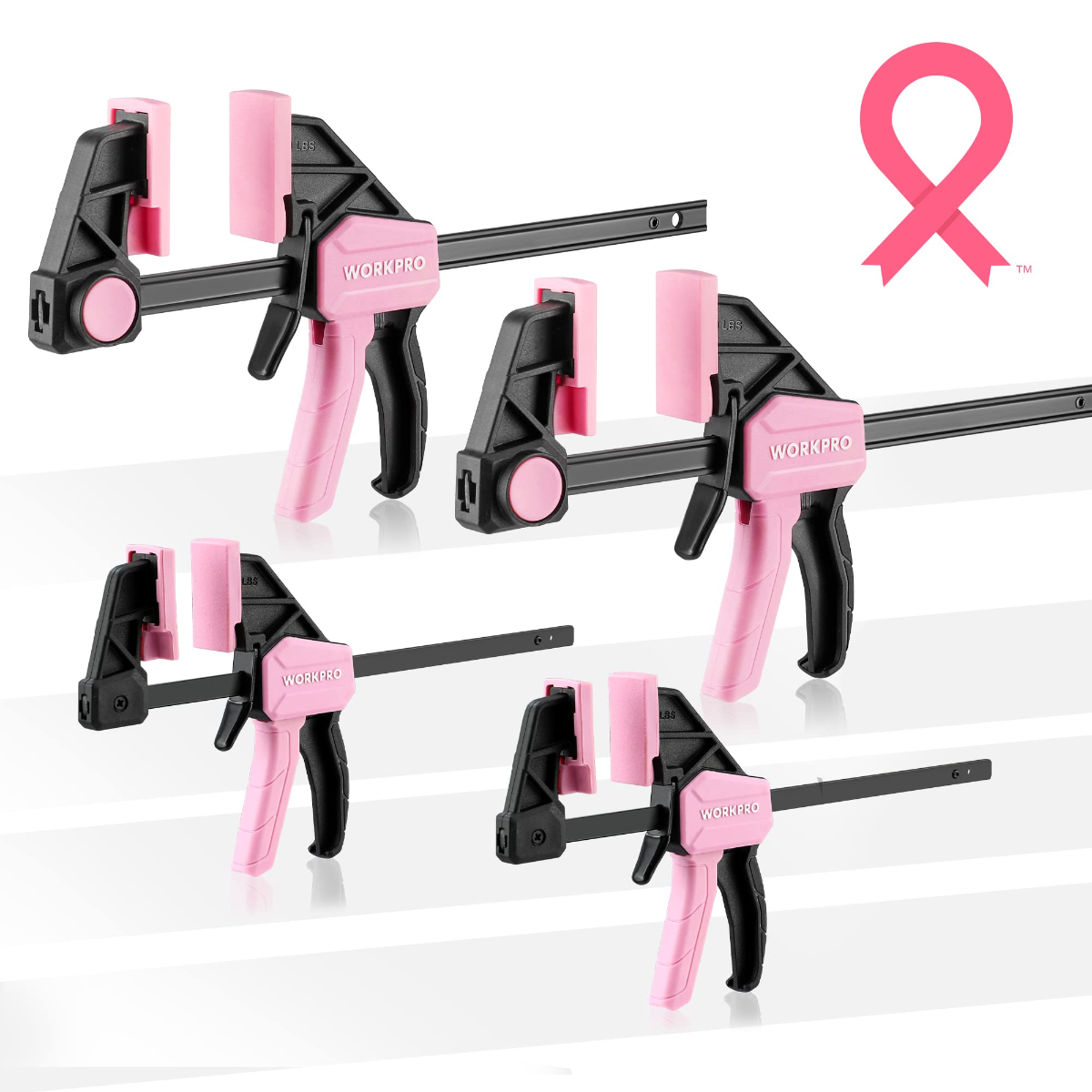 Pink-and-black one-handed clamp/spreader set, multiple mini clamps shown