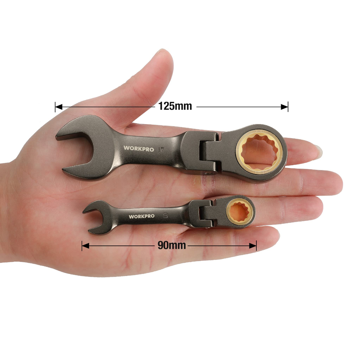 Two stubby ratcheting combination wrenches held in hand with length measurements