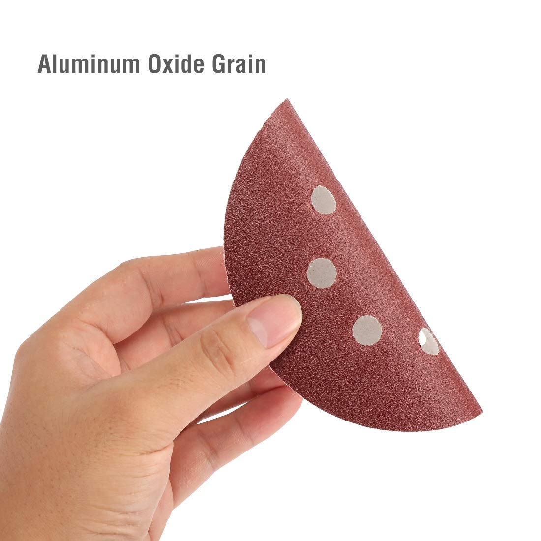 Red sanding disc with hook-and-loop backing and three-pin perforations