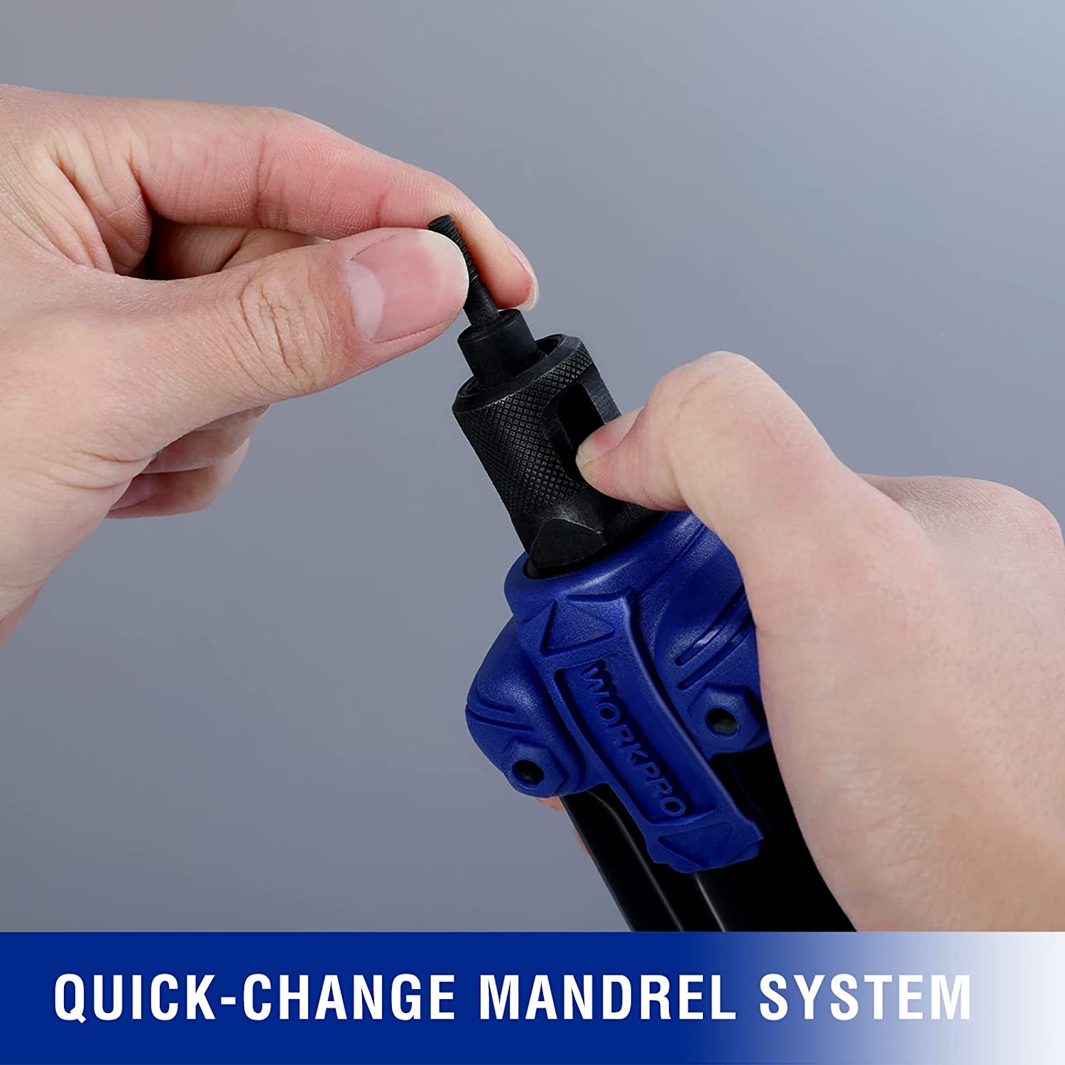Hand using blue-and-black rivet nut setter tool with textured grip and threaded mandrel