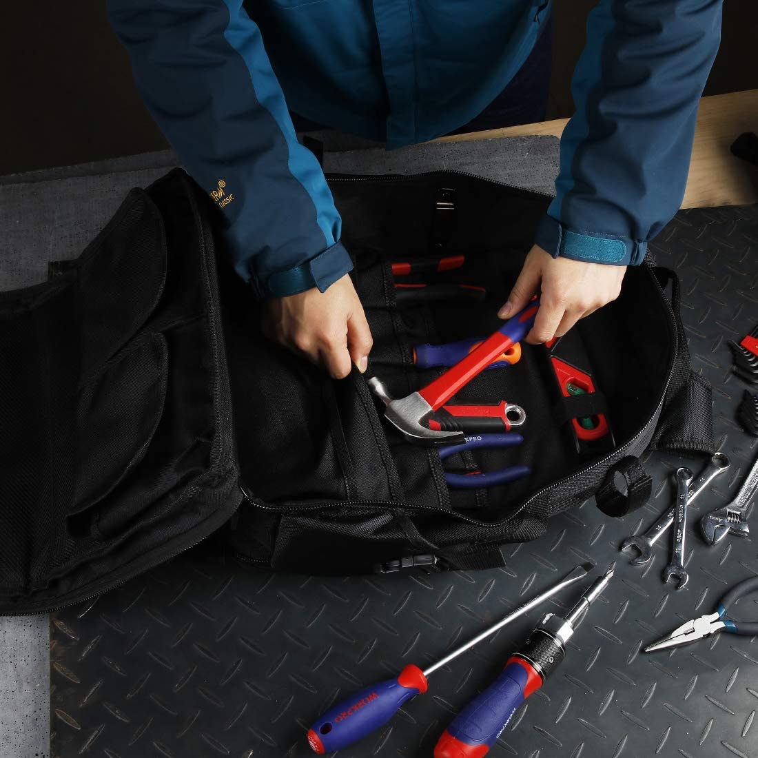 WORKPRO open tool backpack showing compartments filled with hand tools