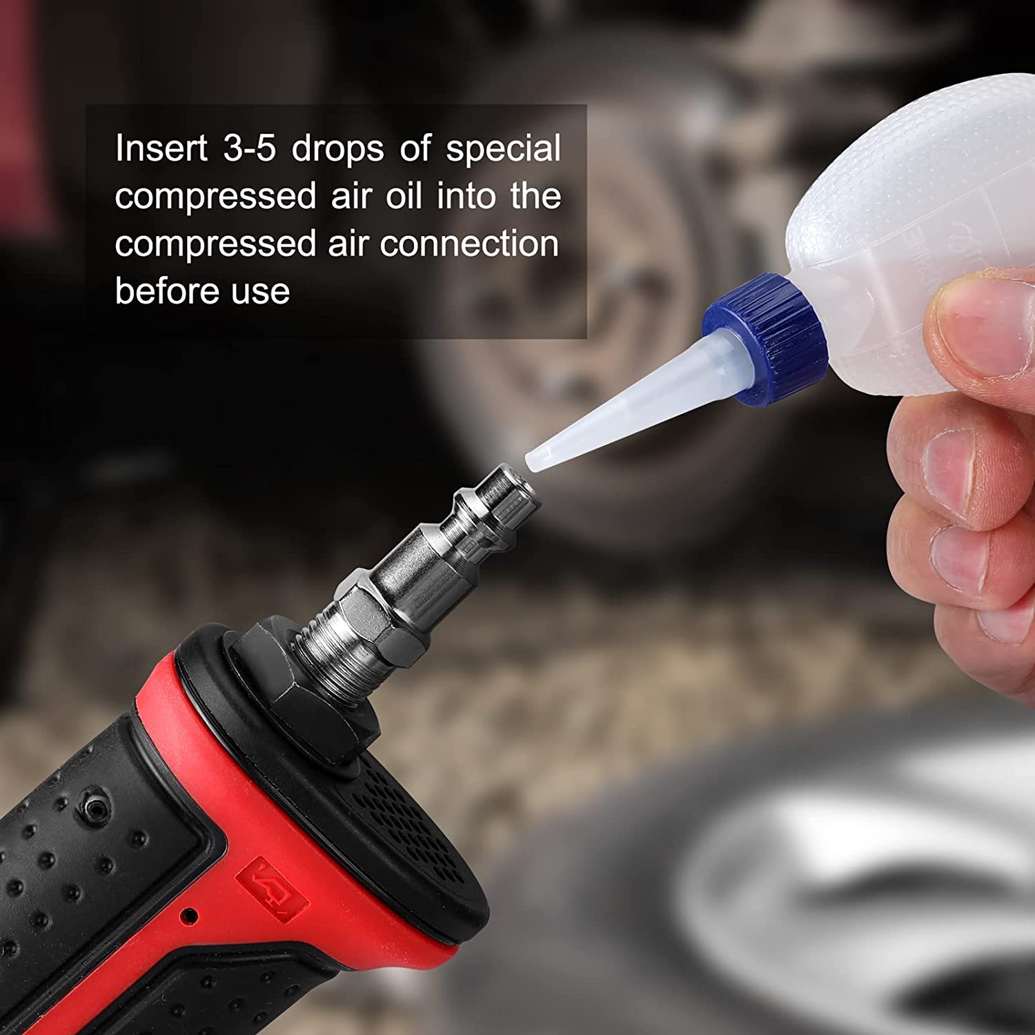 Hand holding air impact wrench; blue oil dropper tip near air connection