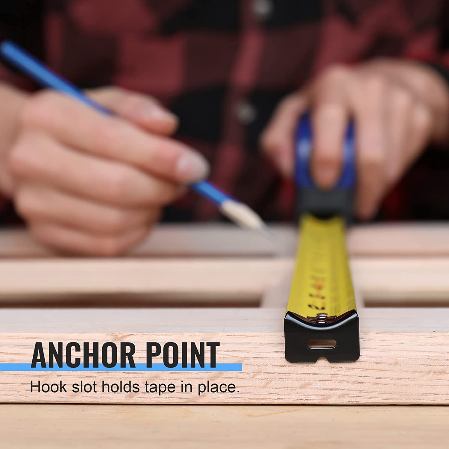 WORKPRO 25-ft tape measure anchor hook holding the tape on wood