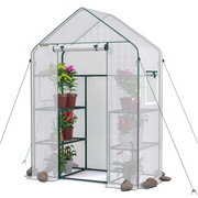Portable walk-in greenhouse with clear PE cover, front zip door, and wire shelves