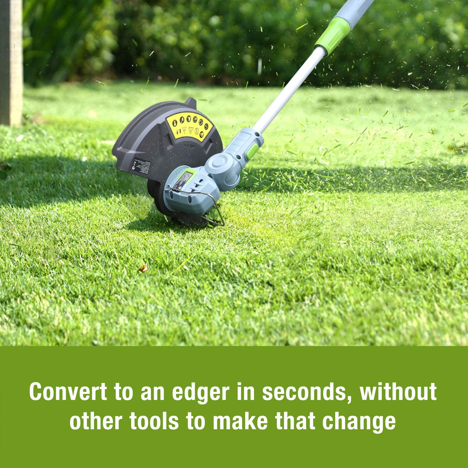 Cordless trimmer cutting line spinning on lawn for edging along ground