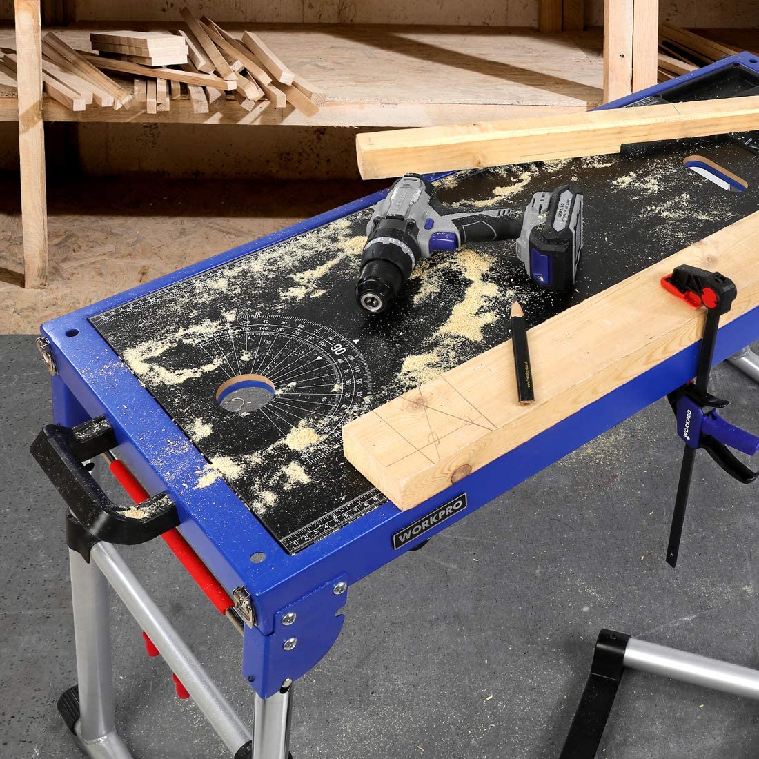 Blue miter saw table top with non-slip surface and mounted ruler scale