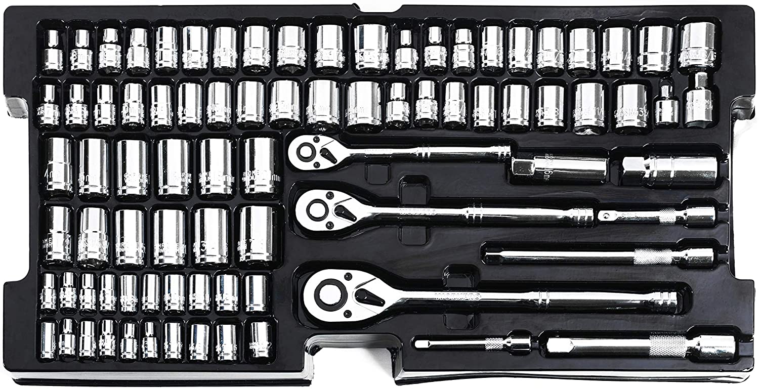 Mechanics tool set tray with rows of chrome socket wrench bits and ratchets