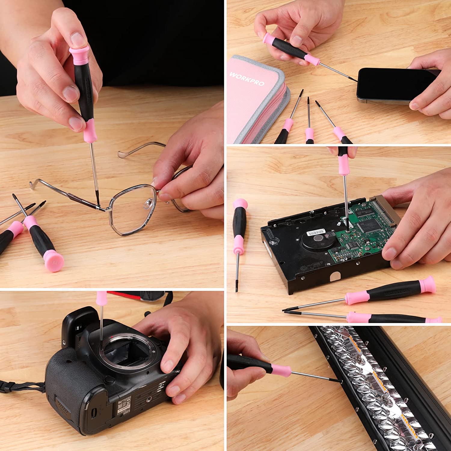 Precision screwdriver set in use on a wooden work surface, with pink-and-black handles