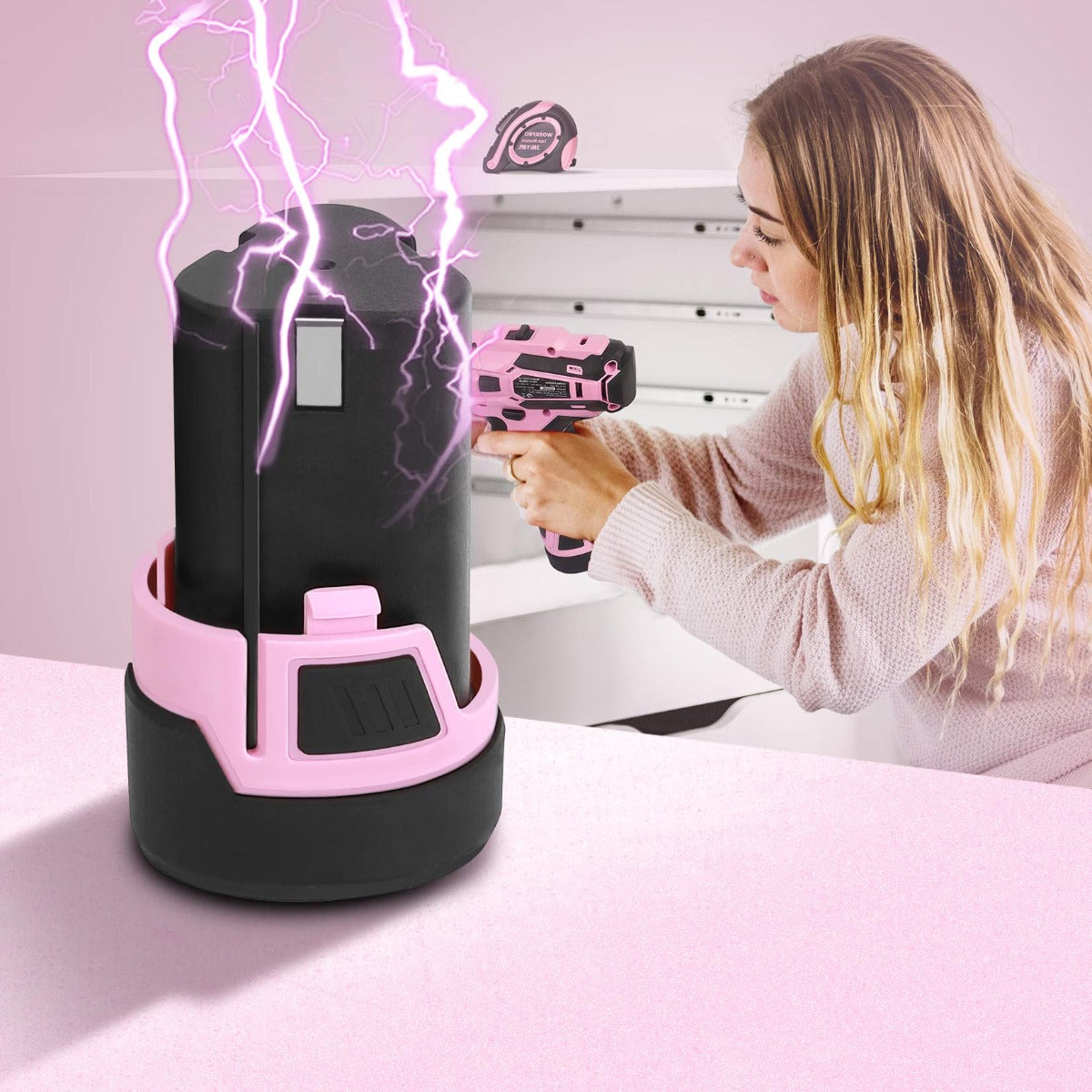 WORKPRO 12V replacement battery in pink dock with cordless drill held nearby.