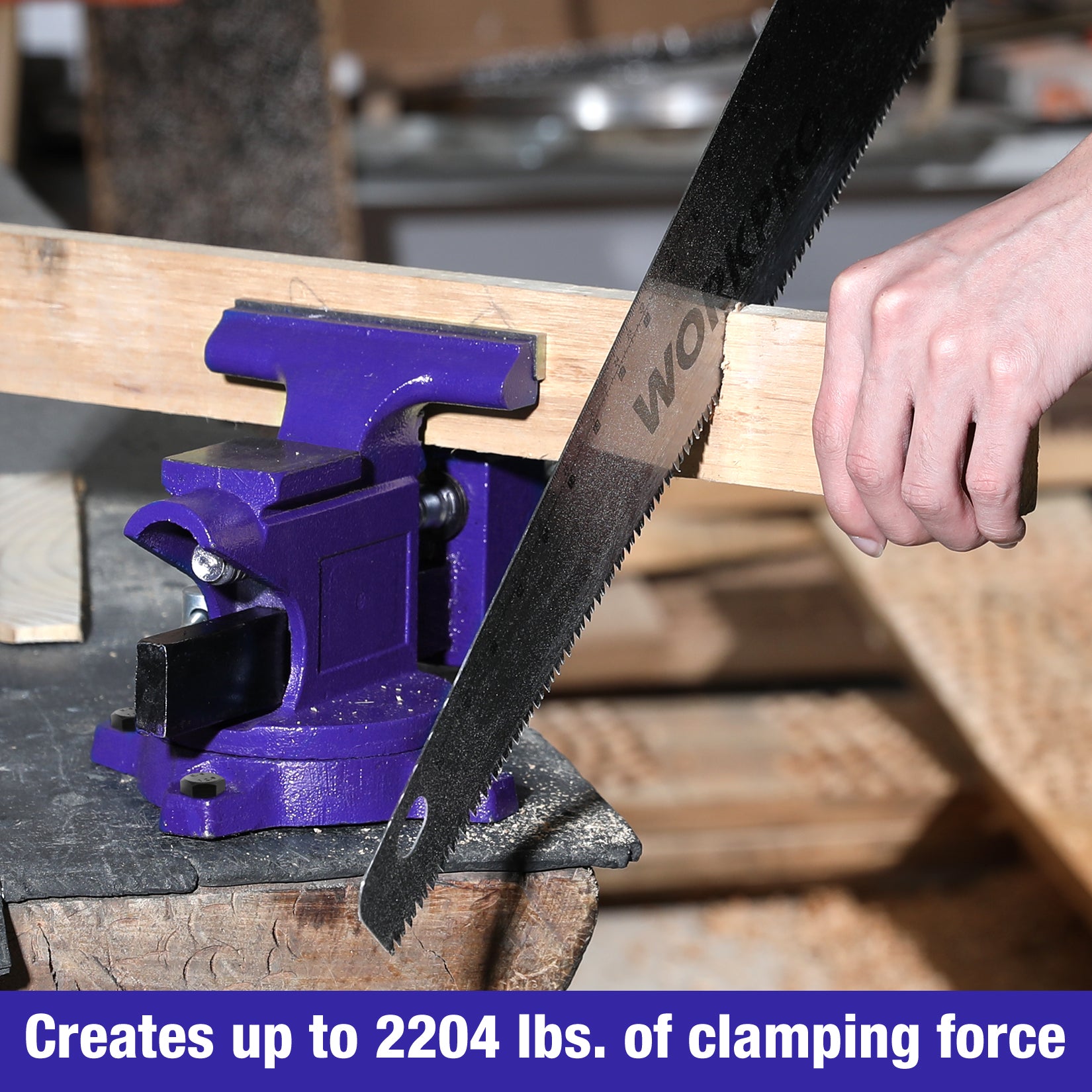 Blue bench vise clamping a wooden board; visible jaws and black serrated plate