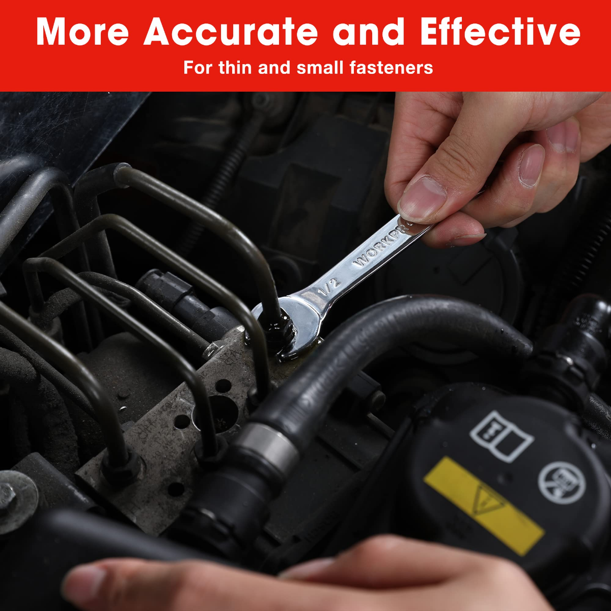 Hand tightening a thin metric open-end wrench on a small engine fastener.
