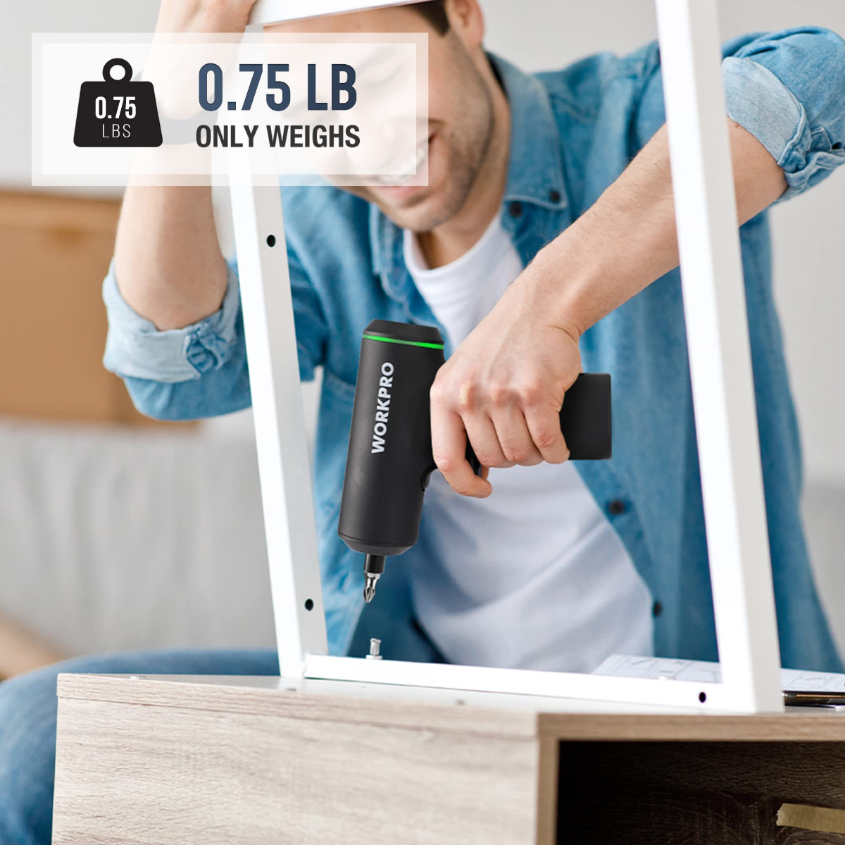 Cordless electric screwdriver, black handle driving a screw with a drill bit