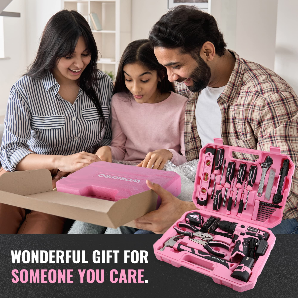 Pink tool set in open case with cordless drill and assorted bits and hand tools